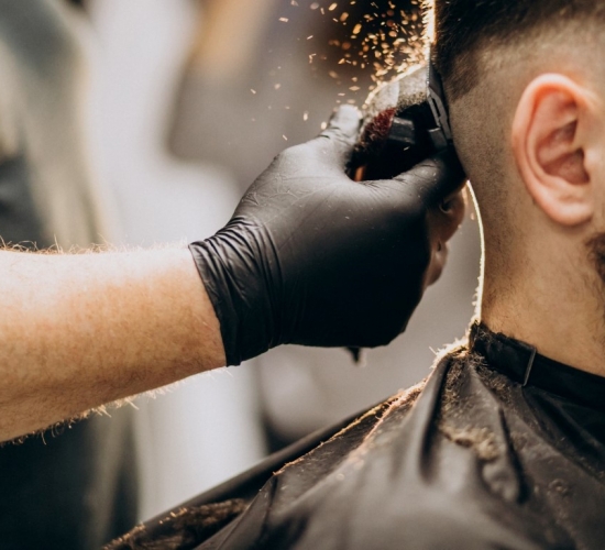 client-doing-hair-cut-barber-shop-salon-1.jpg
